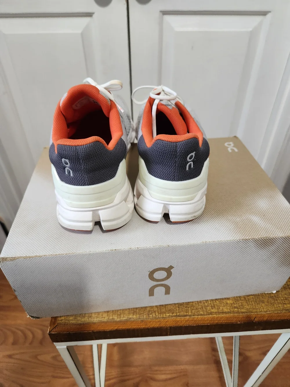 On Running Men’s White and Orange Cloudswift Running Shoes